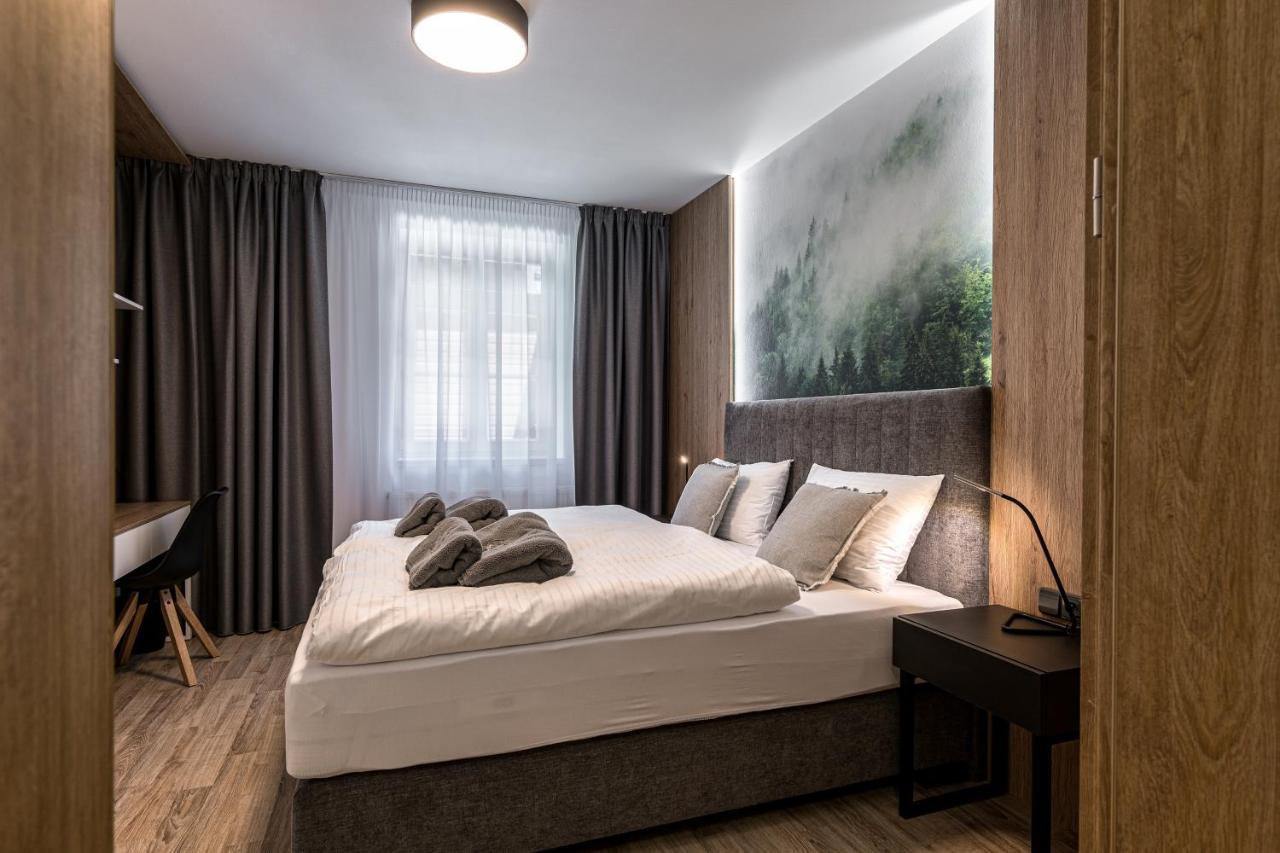 Hubertus Karlova Studanka Aparthotel Bagian luar foto